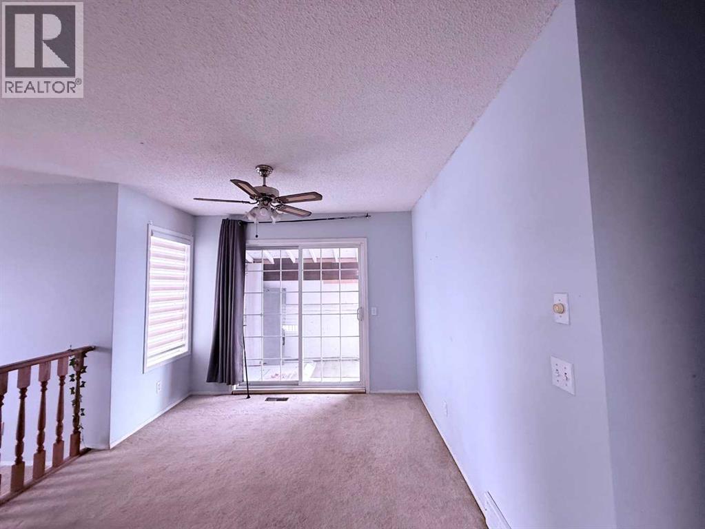 39 Tararidge Court Ne, Calgary, Alberta  T3J 2P9 - Photo 7 - A2353234