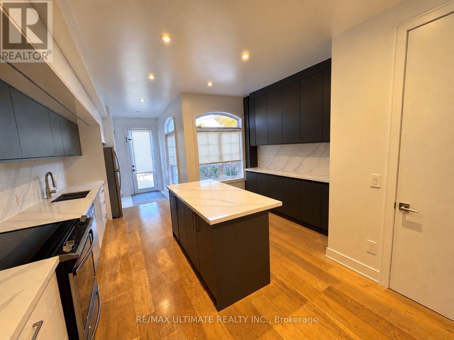 UPPER - 127 HARVIE AVENUE