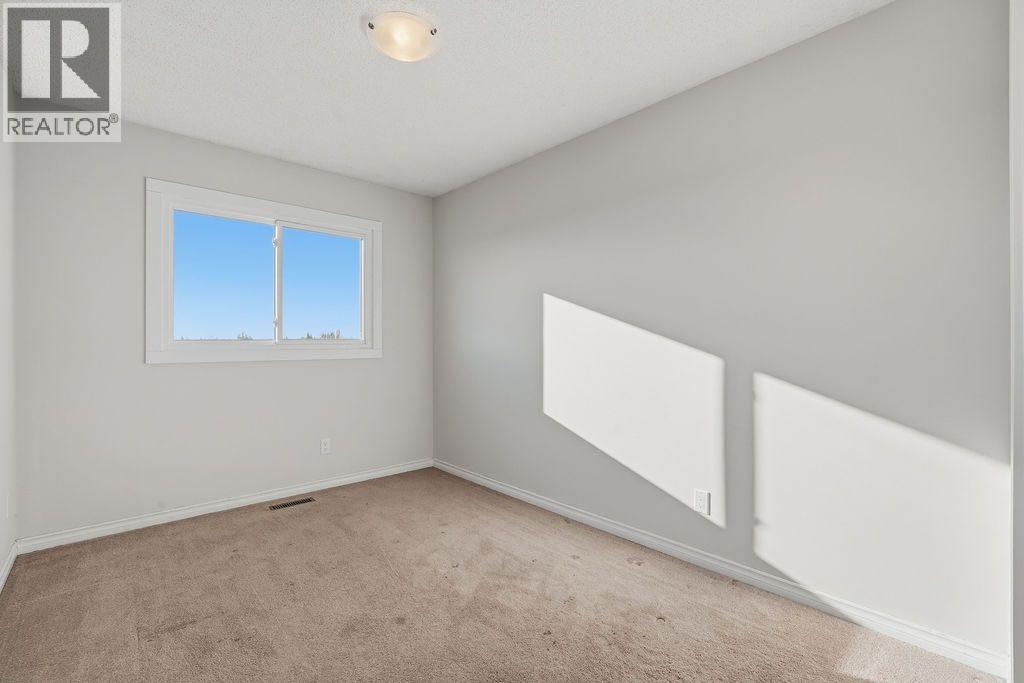 88 Woodfield Drive Sw, Calgary, Alberta  T2W 3T5 - Photo 19 - A2353826