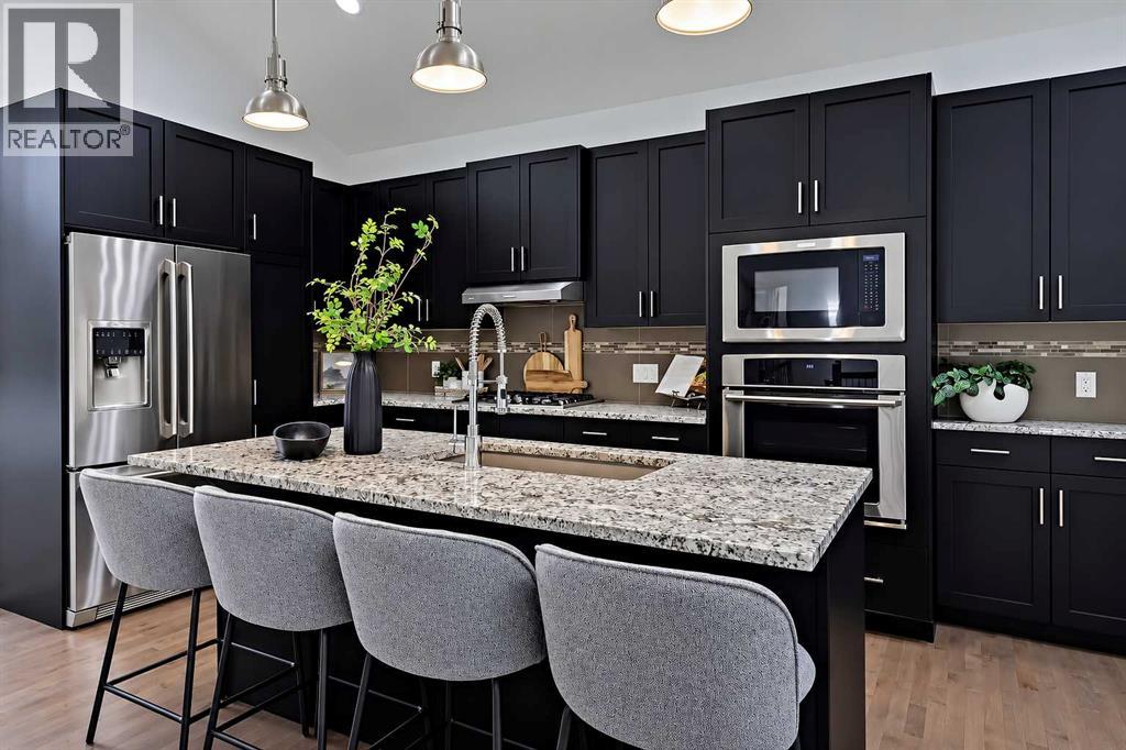 63 Cortina Villas Sw, Calgary, Alberta  T3H 0W8 - Photo 5 - A2354228