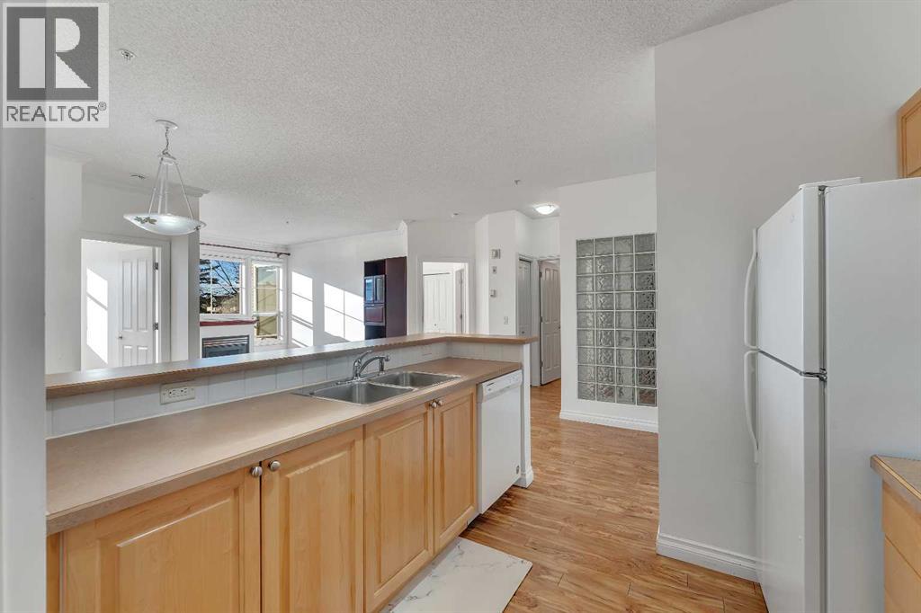 2222, 1010 Arbour Lake Road NW, Calgary, Alberta T3G 4Y8 - Photo 7 - A2354594