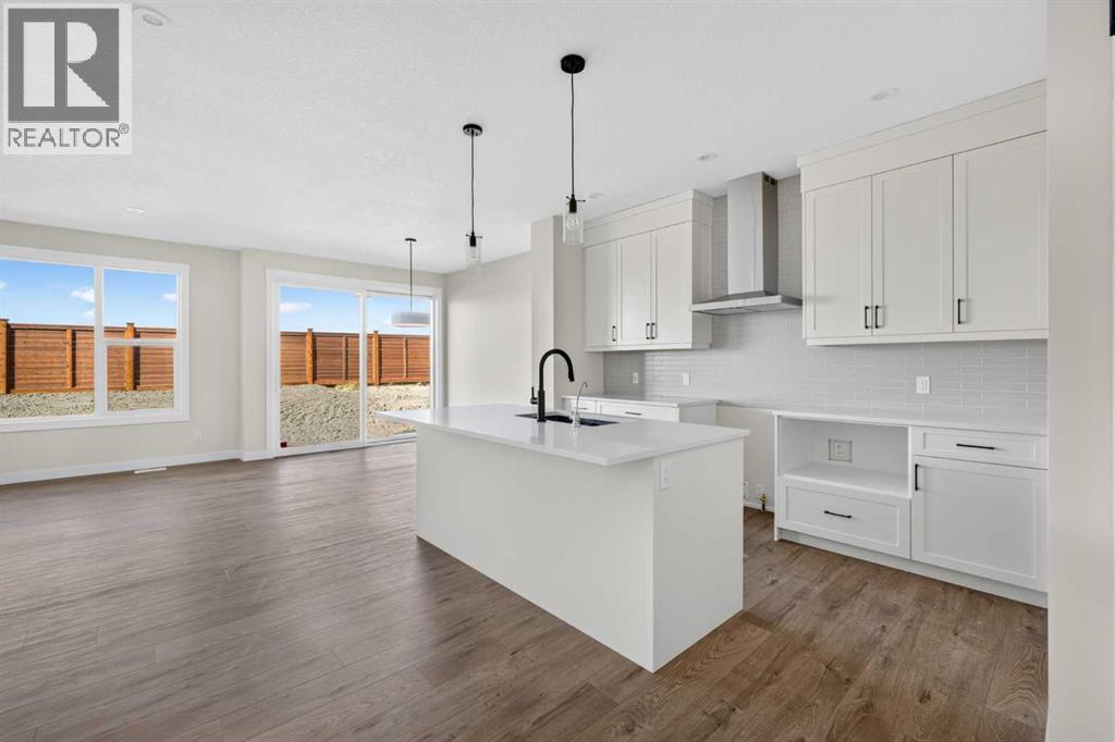 77 Royston Gardens NW, Calgary, Alberta  T3L 0N9 - Photo 5 - A2352770