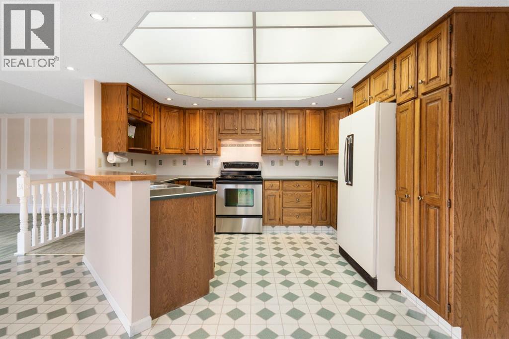 59 Stranraer Place SW, Calgary, Alberta T3H 1H5 - Photo 13 - A2354513