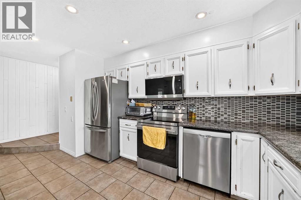 331 Brookmere Road SW, Calgary, Alberta  T2W 2P4 - Photo 4 - A2354864