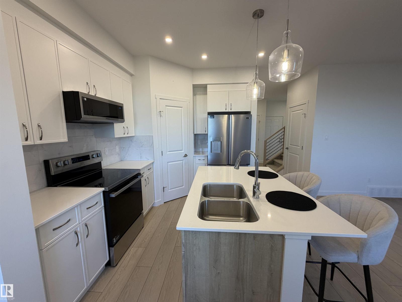 20936 16 Av NW, Edmonton, Alberta  T6M 3J4 - Photo 9 - E4504101
