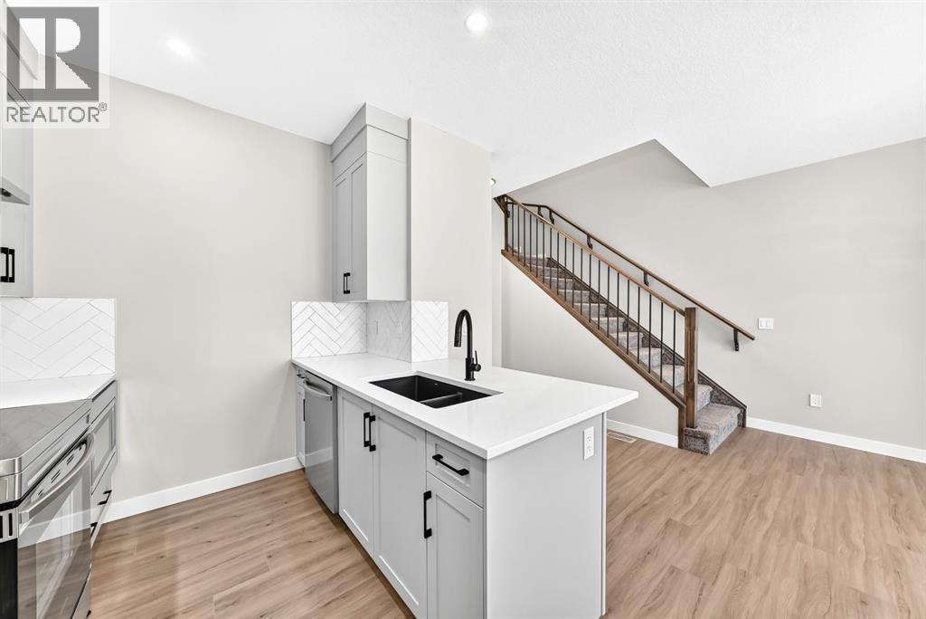 1063 Bayview Crescent SW, Airdrie, Alberta  T4B 5N8 - Photo 7 - A2338037