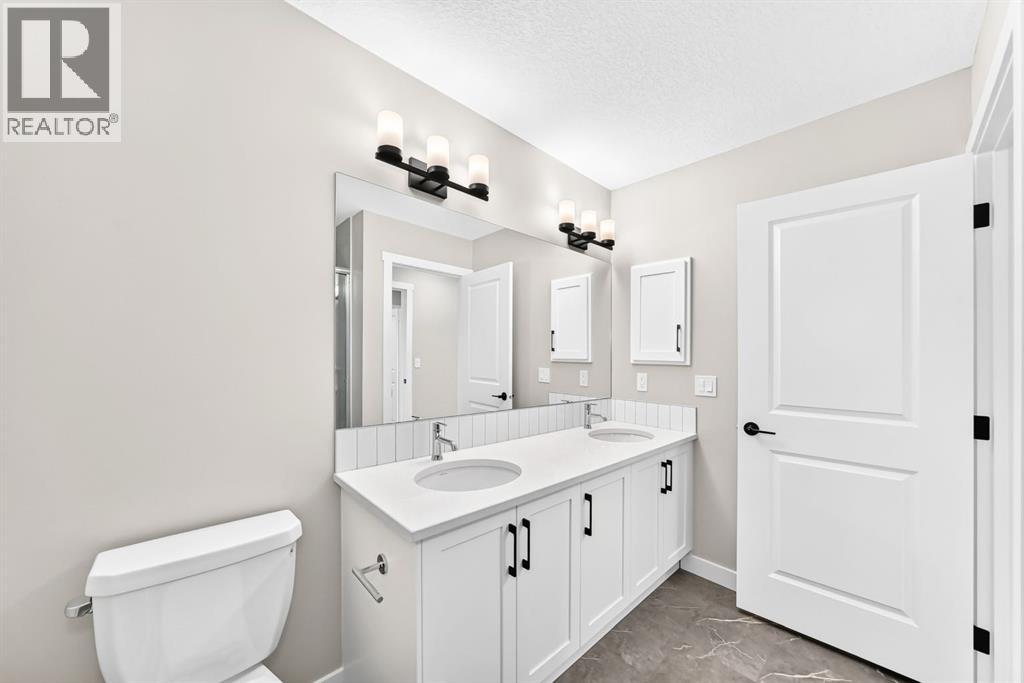 1063 Bayview Crescent SW, Airdrie, Alberta  T4B 5N8 - Photo 21 - A2338037