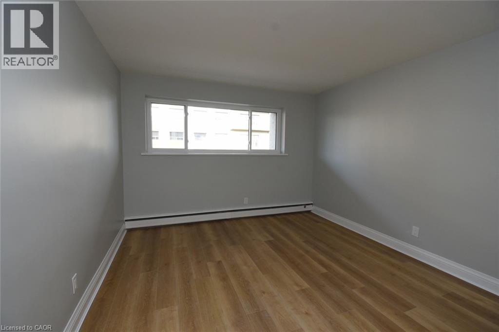 510 Queenston Road Unit# 404, Hamilton, Ontario  L8K 1J3 - Photo 12 - 40874446