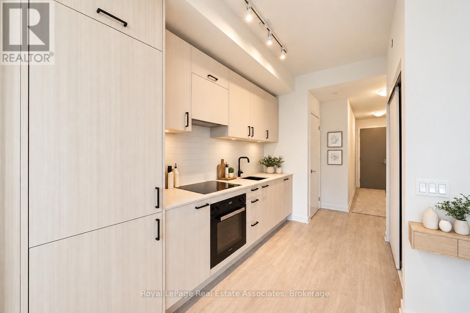 1004 - 1 QUARRINGTON LANE, Toronto, Ontario