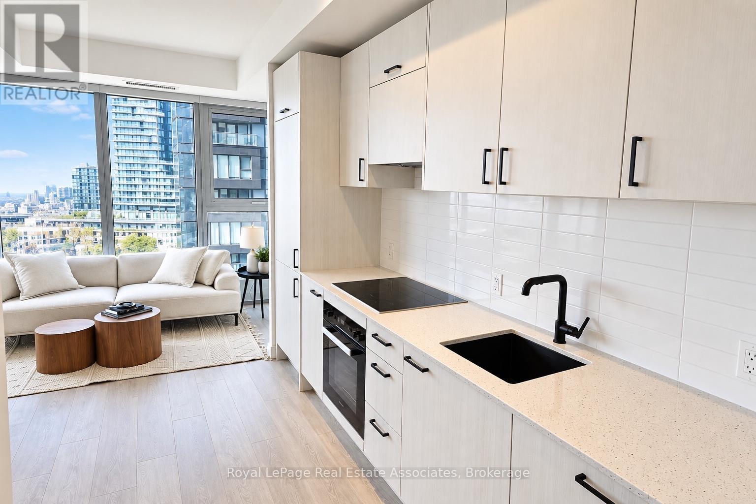 1004 - 1 Quarrington Lane, Toronto, Ontario  M3C 0S4 - Photo 2 - C14124716