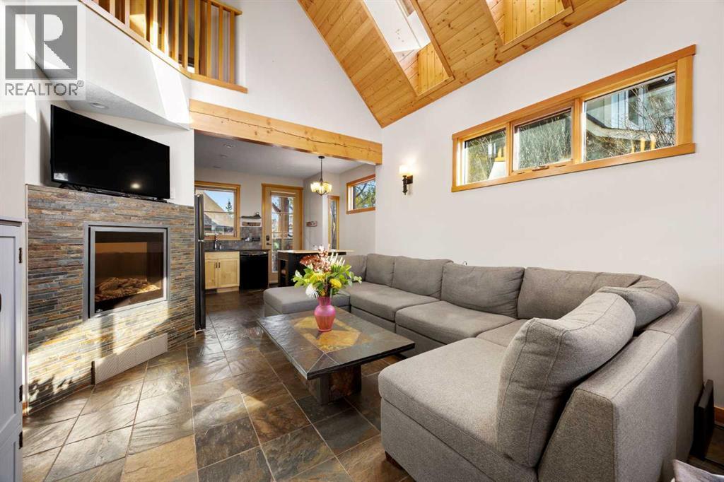 233 Cottage Club Crescent, Rural Rocky View County, Alberta  T4C 1B1 - Photo 10 - A2352897