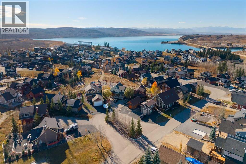 233 Cottage Club Crescent, Rural Rocky View County, Alberta  T4C 1B1 - Photo 39 - A2352897