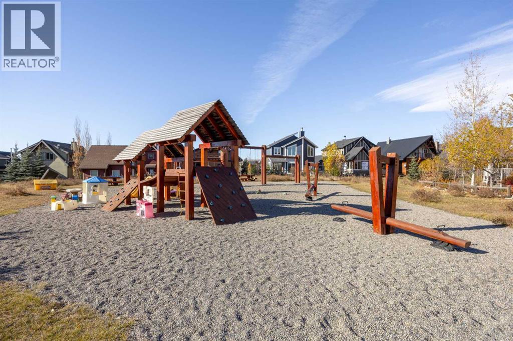 233 Cottage Club Crescent, Rural Rocky View County, Alberta  T4C 1B1 - Photo 33 - A2352897