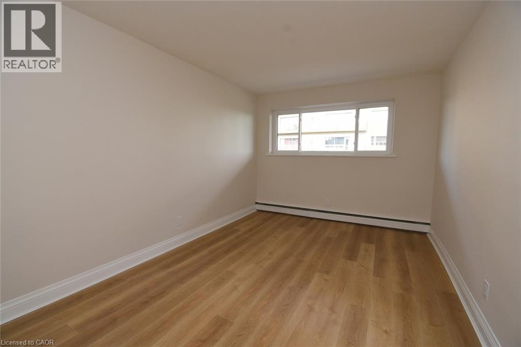 510 Queenston Road Unit# 404, Hamilton, Ontario  L8K 1J3 - Photo 14 - 40874446