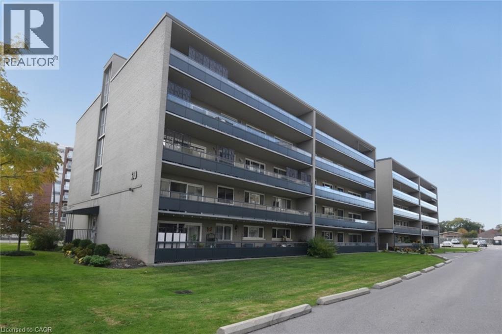 510 Queenston Road Unit# 404, Hamilton, Ontario  L8K 1J3 - Photo 2 - 40874446