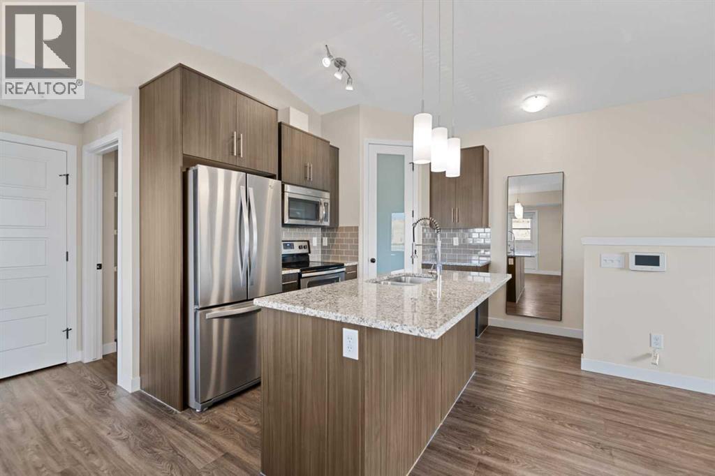 1921, 2461 Baysprings Link SW, Airdrie, Alberta  T4B 4C6 - Photo 4 - A2352767