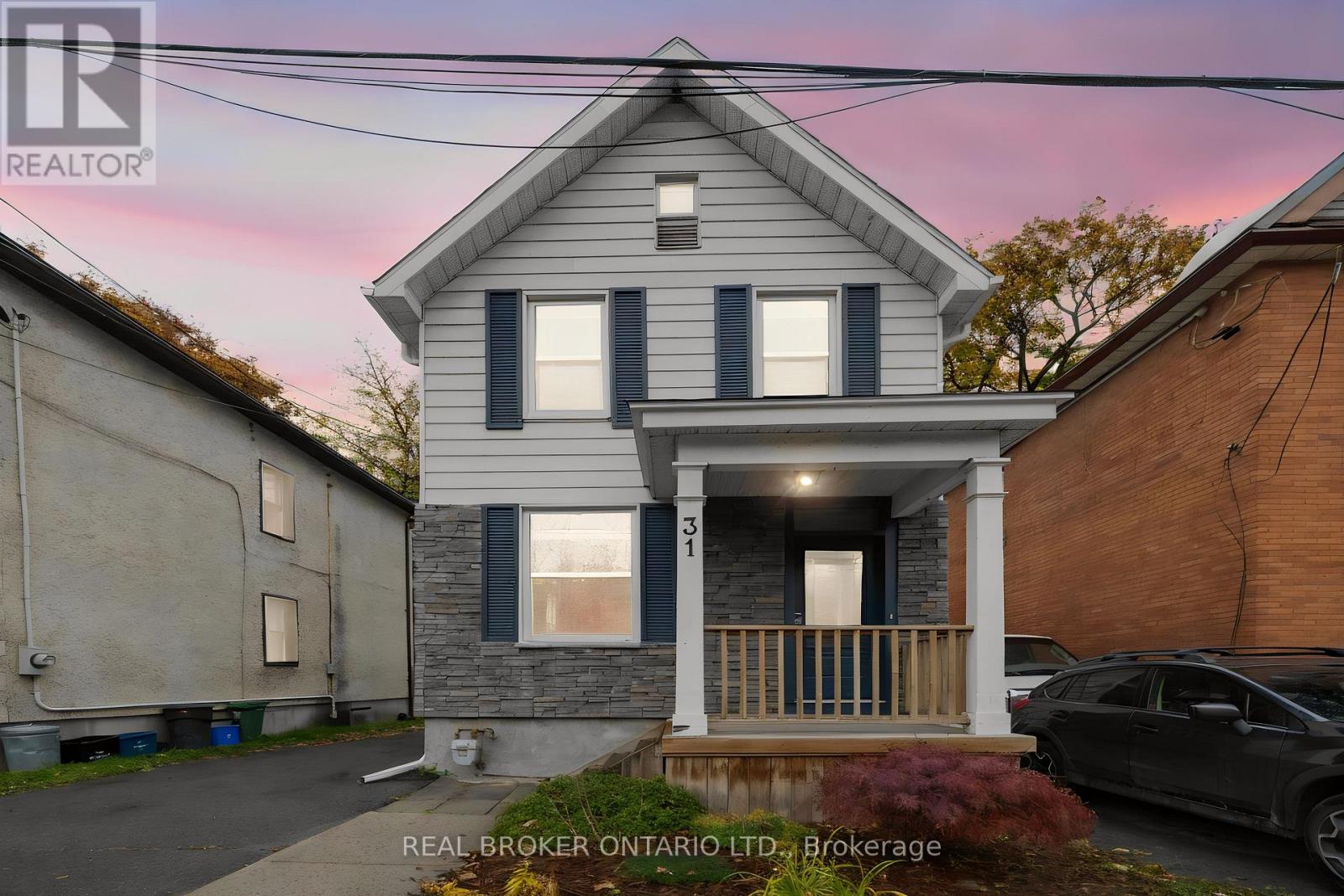 Welcome to 31 Westmount Avenue, a move-in ready detached home tucked away on a cul-de-sac in the heart of Hintonburg. This charming 3 bedroom home combines character, thoughtful updates and everyday practicality. You're within walking distance of the Parkdale Farmers' Market, the shops, cafés and restaurants of Hintonburg and Wellington West, and the Civic Hospital. Enjoy the neighbourhood lifestyle with a short stroll to Heartbreakers Pizza, then follow it up with a sweet treat from the beloved Merry Dairy. Hardwood floors run throughout the home. The inviting living room is anchored by a beautiful gas fireplace with a stone surround. The updated eat-in kitchen features white cabinetry, quartz countertops, stainless steel appliances and peninsula seating. A bright rear dining area opens directly to the back deck, making it easy to entertain and enjoy the outdoors. Upstairs you'll find three bedrooms and an updated full bathroom. The unfinished basement offers laundry, storage and workshop space, with a new washer and dryer added in 2024. Outside, the fully fenced backyard with new cedar fencing is perfect for kids and pets, and there's a custom-built storage shed completed in 2024. The private driveway fits up to three vehicles. Recent updates include a new asphalt shingle roof with updated OSB decking (2023), cedar fencing, a custom front door with transom window, central air and an ecobee smart thermostat. With quick access to Highway 417 and a highly walkable urban location, this well-kept home is ready for its next owners. (id:48254)