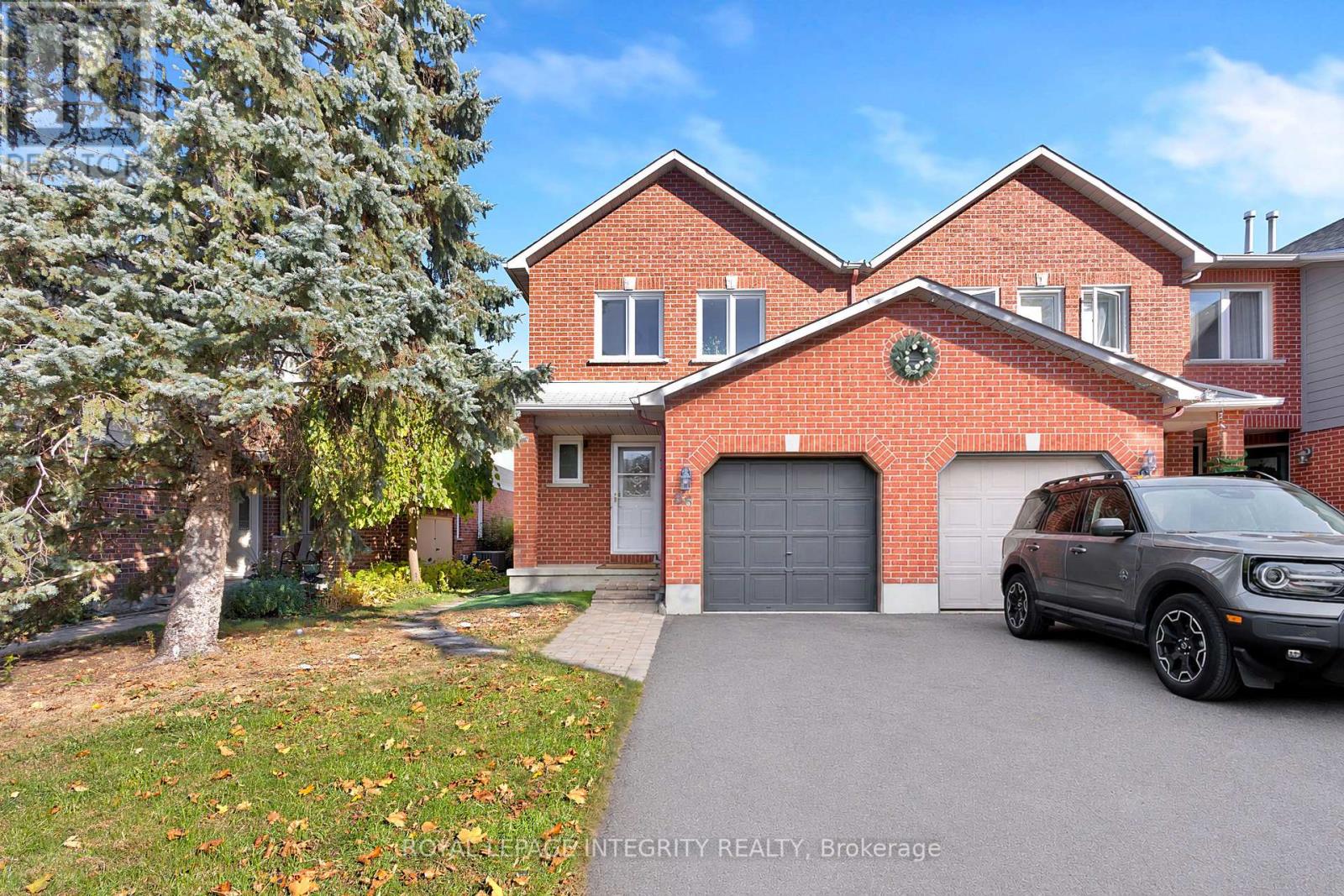 Welcome to 86 Havenhurst, a spacious four-bedroom, four-bathroom end-unit townhouse with a great layout and tons of charm in Ottawa's mature Greenboro community. The main floor feels bright and welcoming, centered around a cozy fireplace and a nicely refreshed kitchen completed in 2026. Upstairs, the bedrooms are generously sized alongside an upgraded main bath featuring a freestanding tub and glass shower. Downstairs, the finished lower level includes its own entrance, kitchenette, full bath, and sitting area-a versatile setup that works brilliantly for long-term guests, multi-generational living, or a dedicated retreat. You'll also appreciate practical upgrades for true peace of mind, including a high-efficiency furnace, central A/C, Nest smart thermostat, updated attic insulation, and a backwater valve. Out back, a private, fenced yard gives you a quiet outdoor spot for summer hangouts, while the attached garage makes winter parking easy. It's a wonderful opportunity to settle into a well-kept home right near local parks, trails, and bike paths-book your private showing today to experience it in person! (Buyer to verify future lower-level usage and conformance options.) (id:48254)
