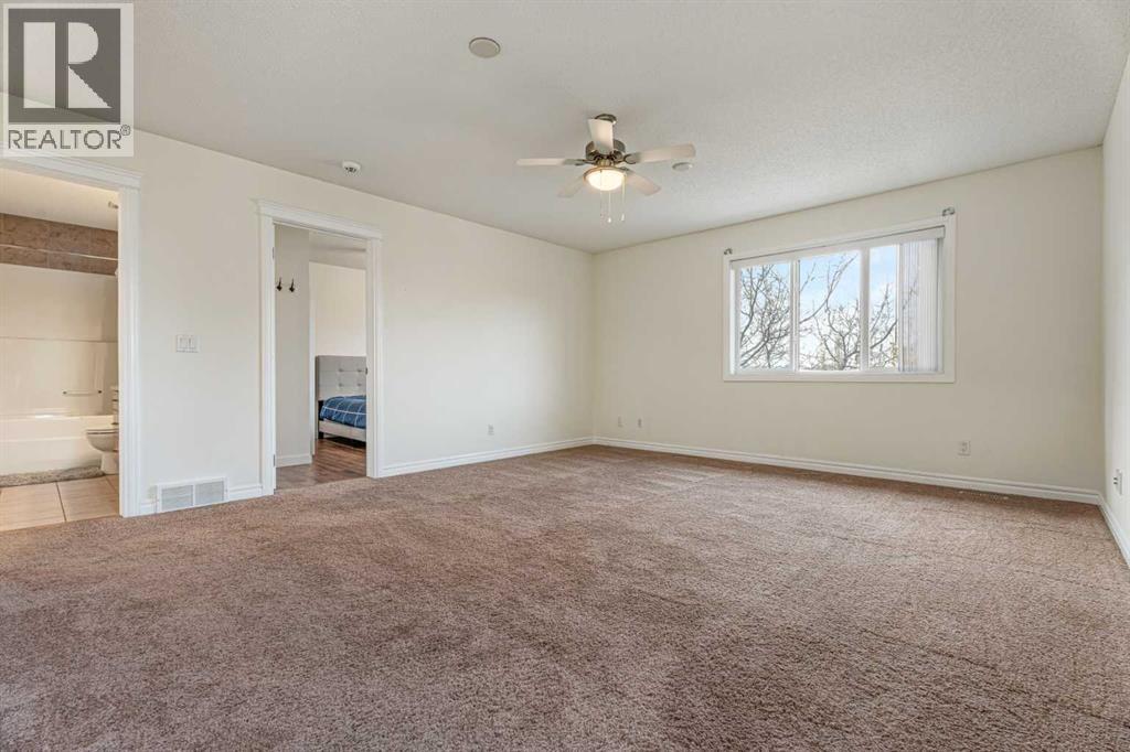 113 Cimarron Vista Crescent, Okotoks, Alberta  T1S 0K2 - Photo 18 - A2354922