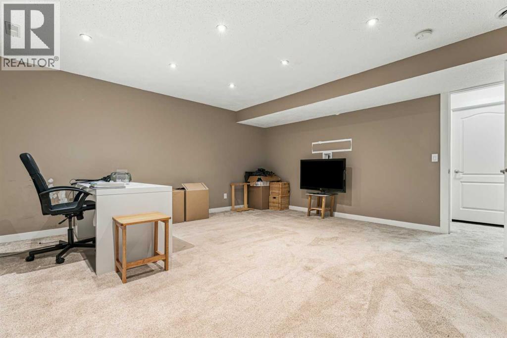 113 Cimarron Vista Crescent, Okotoks, Alberta  T1S 0K2 - Photo 38 - A2354922