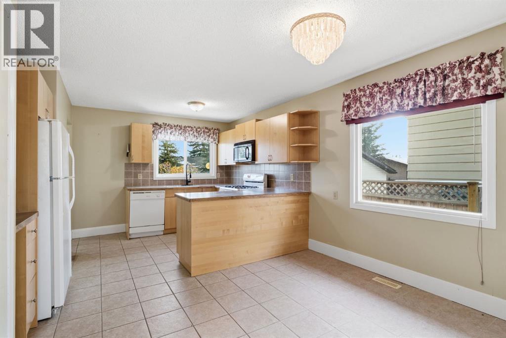 20 Glenpatrick Place, Cochrane, Alberta  T4C 1H6 - Photo 9 - A2354748