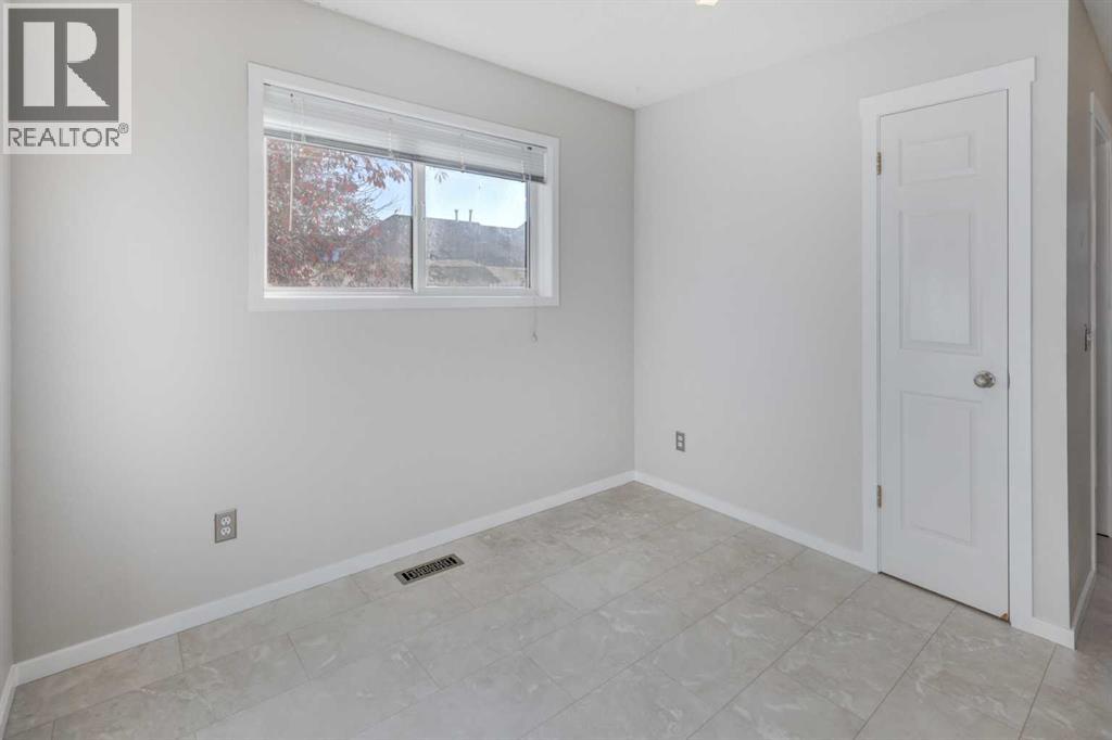 28 Woodside Circle NW, Airdrie, Alberta  T4B 2H8 - Photo 15 - A2351886