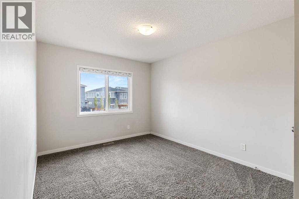 62 Wolf Hollow Way SE, Calgary, Alberta  T2X 1T8 - Photo 25 - A2353103