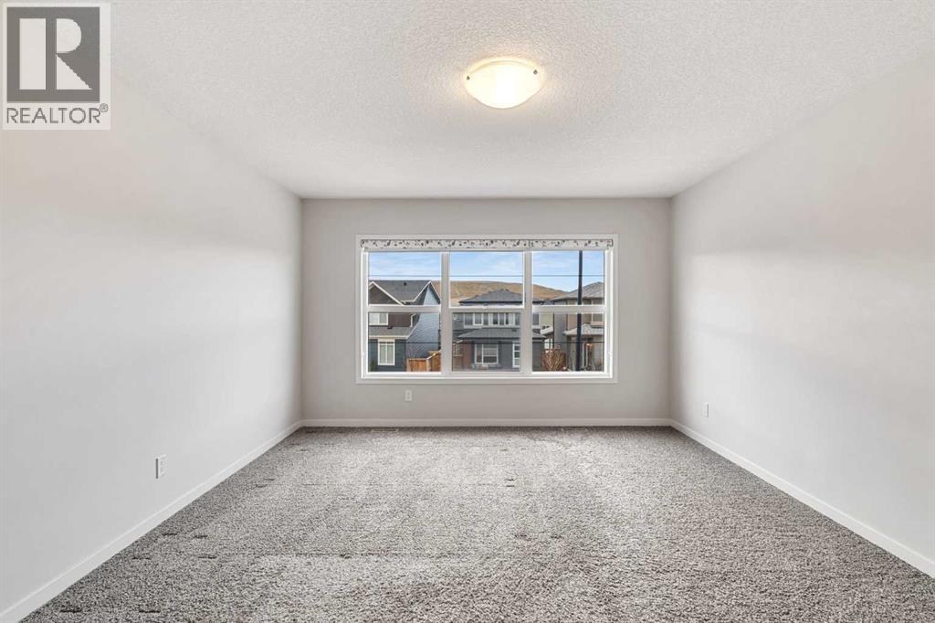 62 Wolf Hollow Way SE, Calgary, Alberta  T2X 1T8 - Photo 19 - A2353103