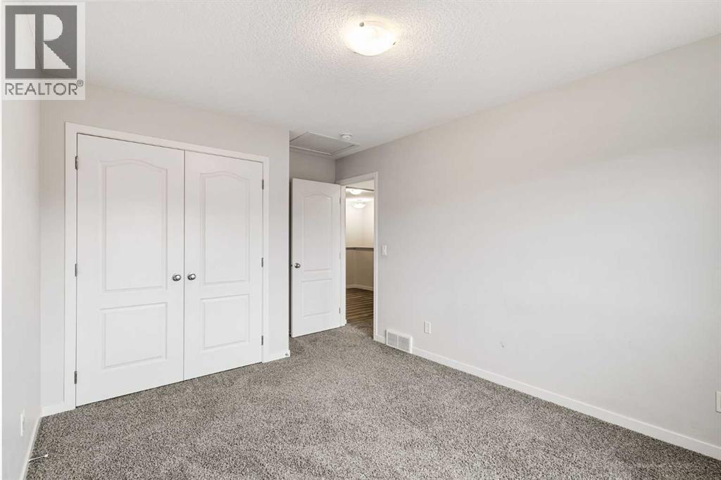 62 Wolf Hollow Way SE, Calgary, Alberta  T2X 1T8 - Photo 26 - A2353103