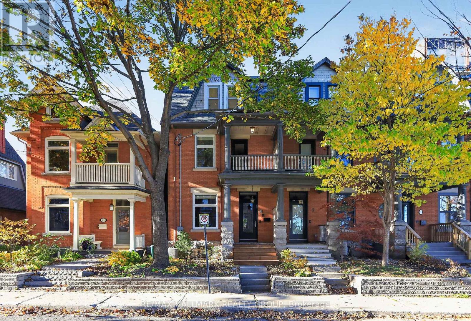 In the heart of the Glebe, steps from the Rideau Canal, 11 Third Avenue is a remarkable 1907 redbrick end-unit townhome, completely reimagined by acclaimed Ottawa firm Grassroots Design & Build. Far beyond a cosmetic renovation, this three-storey transformation thoughtfully reshaped the home's layout, pairing its century-old character with exceptional craftsmanship and modern comfort.At its heart is a showstopping kitchen, where custom wraparound cabinetry in rich green, an exposed-brick feature wall, marble hexagon backsplash and striking lighting create a space as welcoming as it is beautiful. Reclaimed Ottawa Valley birch engineered hardwood, warm wood beams and carefully chosen finishes bring texture and continuity to the main floor, designed for gathering, cooking and entertaining. Upstairs, versatile bedrooms offer plenty of flexibility for family, guests or a dedicated home office. The top-floor primary retreat is something special: a peaceful sanctuary, complete with heated floors, an open spa-inspired shower and a statement navy bathtub under a beautiful skylight. With 3 bedrooms plus a den or office, 2.5 bathrooms and TWO parking spaces, this home offers flexibility that's hard to find in such a central location. The unfinished basement provides additional potential for a future bedroom, recreation room or other flexible living space. Step outside and discover why the Glebe is one of Ottawa's most loved neighbourhoods. Walk along the Canal, browse independent shops, enjoy local cafés and restaurants, or catch a game or concert at nearby Lansdowne. Beautifully considered from top to bottom and featured in Ottawa at Home magazine, 11 Third Avenue offers a rare opportunity to enjoy the soul of a historic home with the ease and beauty of a truly comprehensive renovation. A home with a story, ready for its next chapter. (id:48254)
