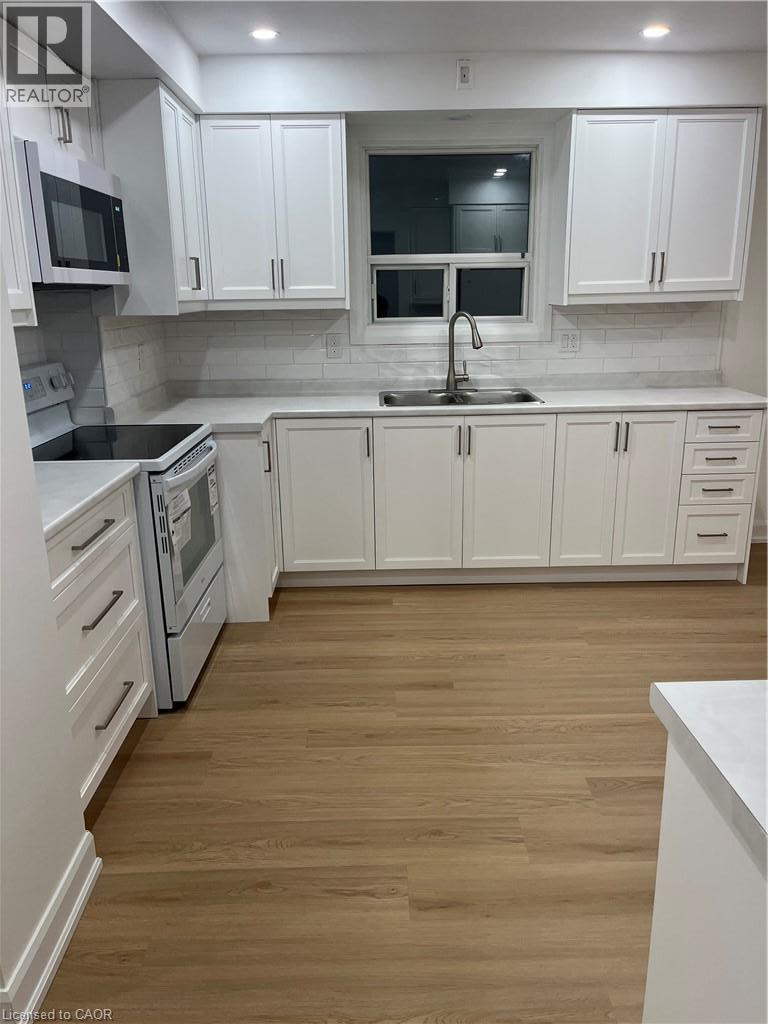 42 Woodman Drive S Unit# Upper, Hamilton, Ontario  L8K 4E4 - Photo 6 - 40867937