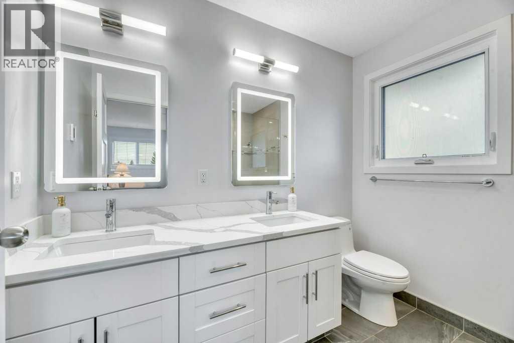 408 Woodside Road SW, Calgary, Alberta  T2W 3J7 - Photo 24 - A2355432