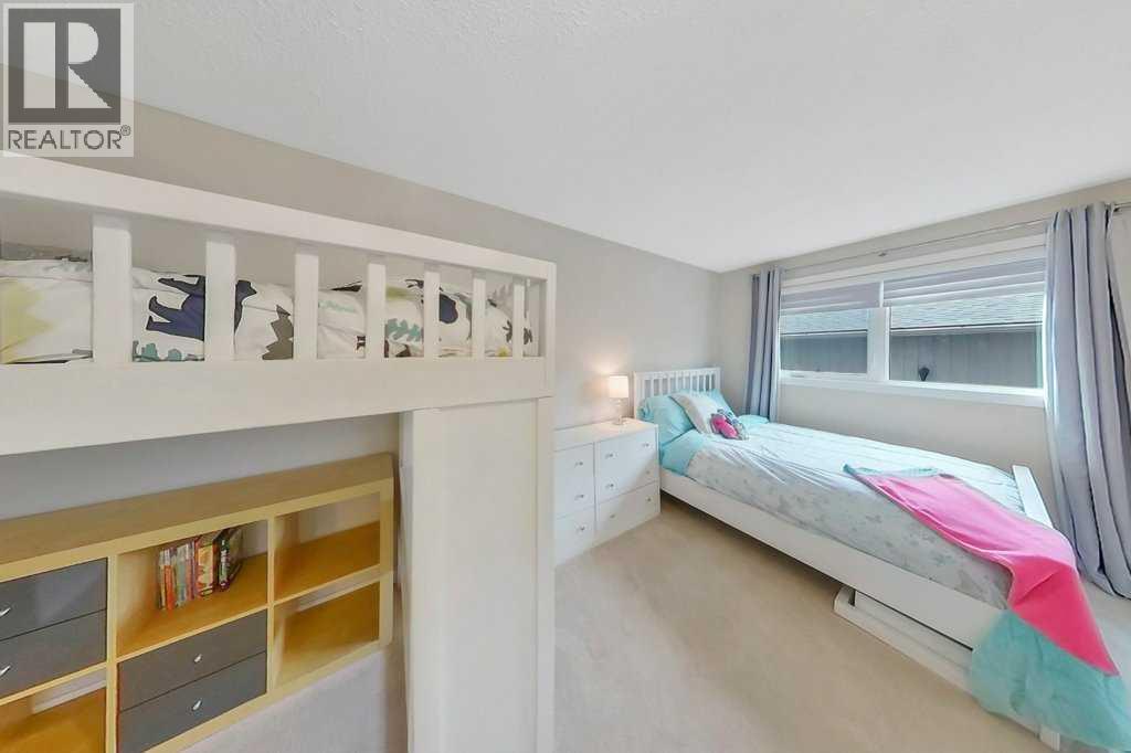 408 Woodside Road SW, Calgary, Alberta  T2W 3J7 - Photo 28 - A2355432