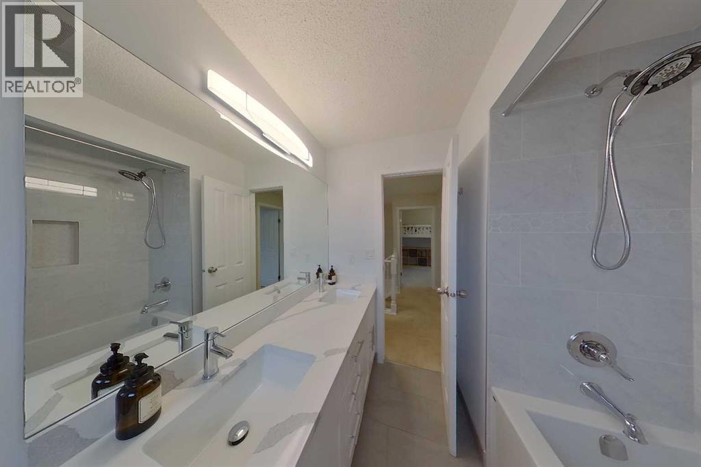 408 Woodside Road SW, Calgary, Alberta  T2W 3J7 - Photo 27 - A2355432
